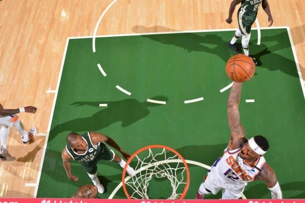 Torrey Craig of the Phoenix Suns dunks the ball against the Milwaukee Bucks during Game Three of the 2021 NBA Finals on July 11, 2021 at Fiserv Forum...