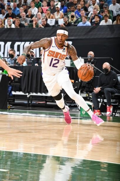 Torrey Craig of the Phoenix Suns handles the ball during the game against the Milwaukee Bucks during Game Three of the 2021 NBA Finals on July 11,...