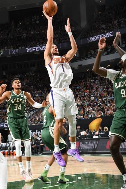 Devin Booker of the Phoenix Suns shoots the ball during the game against the Milwaukee Bucks during Game Three of the 2021 NBA Finals on July 11,...