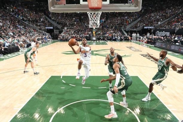 Chris Paul of the Phoenix Suns shoots the ball against the Milwaukee Bucks during Game Three of the 2021 NBA Finals on July 11, 2021 at the Fiserv...