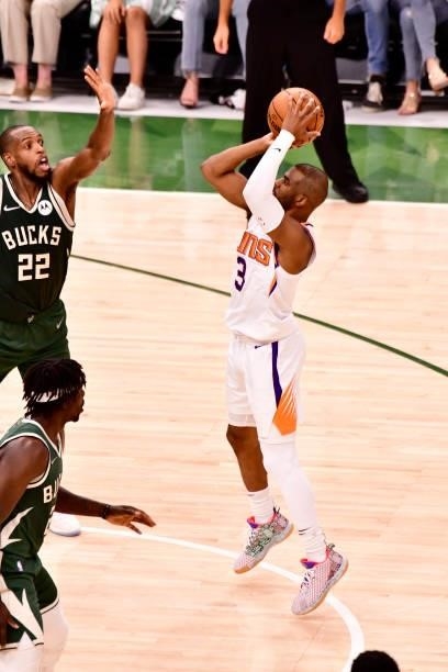 July 11: Chris Paul of the Phoenix Suns shoots the ball against the Milwaukee Bucks during Game Three of the 2021 NBA Finals on July 11, 2021 at the...