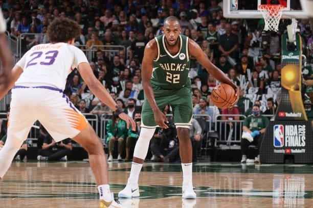 Khris Middleton of the Milwaukee Bucks dribbles the ball during Game Three of the 2021 NBA Finals on July 11, 2021 at the Fiserv Forum Center in...