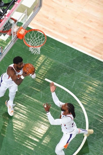 Deandre Ayton of the Phoenix Suns rebounds the ball during the game against the Milwaukee Bucks during Game Three of the 2021 NBA Finals on July 11,...