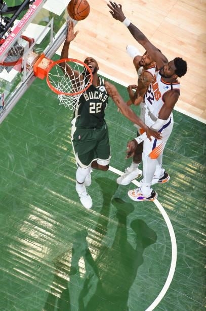 Khris Middleton of the Milwaukee Bucks drives to the basket during the game against the Phoenix Suns during Game Three of the 2021 NBA Finals on July...