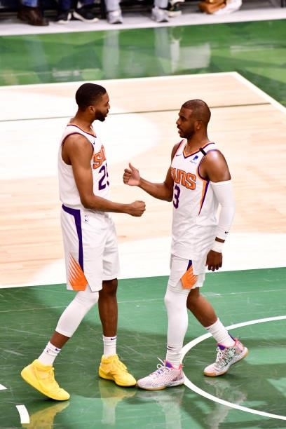 July 11: Chris Paul of the Phoenix Suns high fives Mikal Bridges of the Phoenix Suns during Game Three of the 2021 NBA Finals on July 11, 2021 at the...