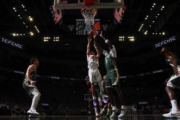 July 11: Devin Booker of the Phoenix Suns shoots the ball against the Milwaukee Bucks during Game Three of the 2021 NBA Finals on July 11, 2021 at...