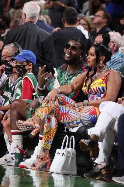 Artists, Gucci Mane and Keshia Ka'Oir attend the game between the Phoenix Suns and the Milwaukee Bucks during Game Three of the 2021 NBA Finals on...