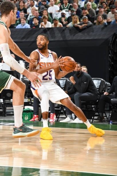 Mikal Bridges of the Phoenix Suns handles the ball during the game against the Milwaukee Bucks during Game Three of the 2021 NBA Finals on July 11,...