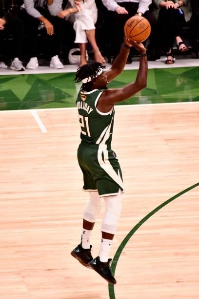 July 11: Jrue Holiday of the Milwaukee Bucks shoots the ball against the Phoenix Suns during Game Three of the 2021 NBA Finals on July 11, 2021 at...
