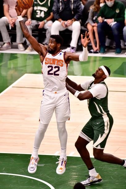 July 11: Deandre Ayton of the Phoenix Suns rebounds the ball against the Milwaukee Bucks during Game Three of the 2021 NBA Finals on July 11, 2021 at...