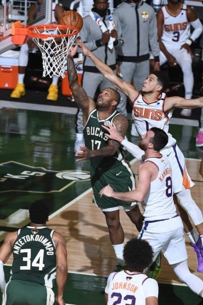 July 11: P.J. Tucker of the Milwaukee Bucks drives to the basket against the Phoenix Suns during Game Three of the 2021 NBA Finals on July 11, 2021...