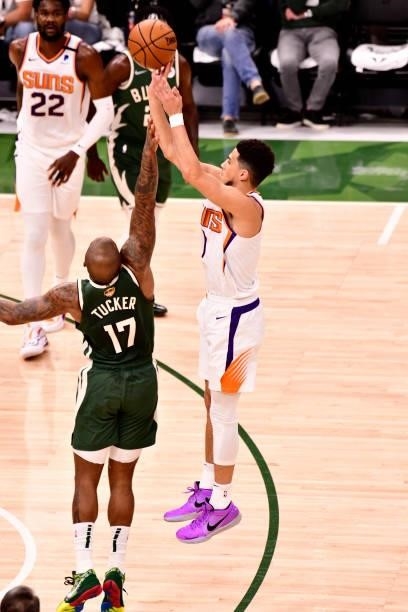 July 11: Devin Booker of the Phoenix Suns shoots the ball against the Milwaukee Bucks during Game Three of the 2021 NBA Finals on July 11, 2021 at...