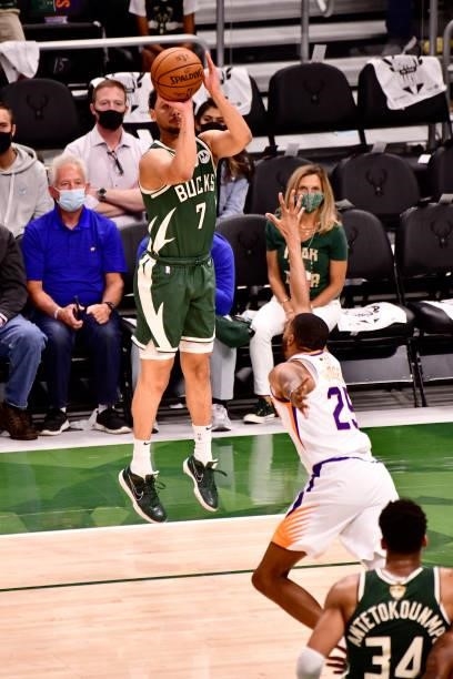 July 11: Bryn Forbes of the Milwaukee Bucks shoots a three point basket against the Phoenix Suns during Game Three of the 2021 NBA Finals on July 11,...
