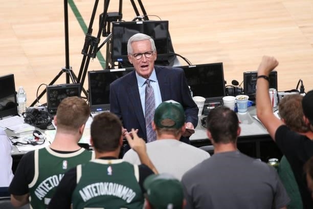 Analyst Mike Breen talks to fans before the Milwaukee Bucks game against the Phoenix Suns during Game Three of the 2021 NBA Finals on July 11, 2021...