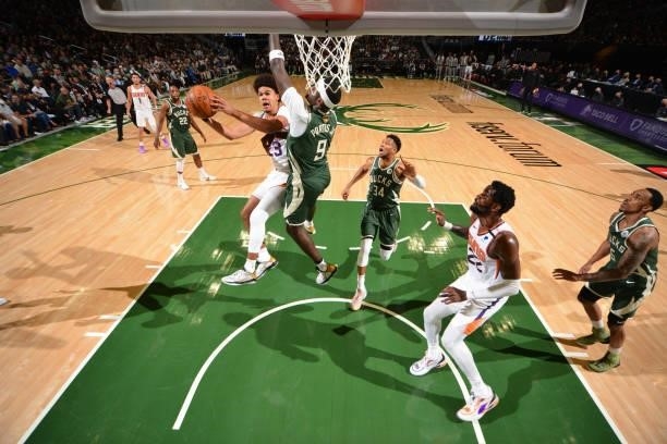 Cameron Johnson of the Phoenix Suns shoots the ball against the Milwaukee Bucks during Game Three of the 2021 NBA Finals on July 11, 2021 at Fiserv...