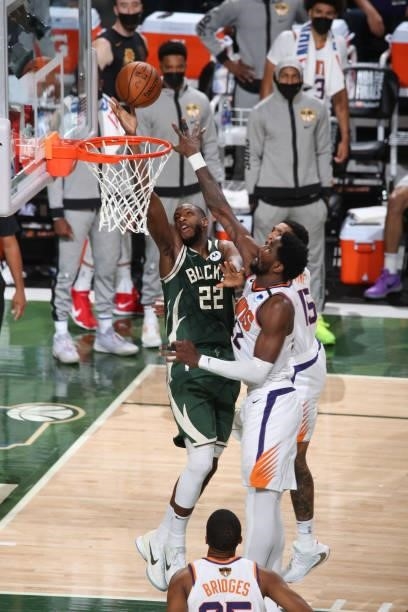 Khris Middleton of the Milwaukee Bucks/ shoots the ball during the game against the Phoenix Suns during Game Three of the 2021 NBA Finals on July 11,...