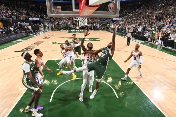 Khris Middleton of the Milwaukee Bucks drives to the basket during the game against the Phoenix Suns during Game Three of the 2021 NBA Finals on July...