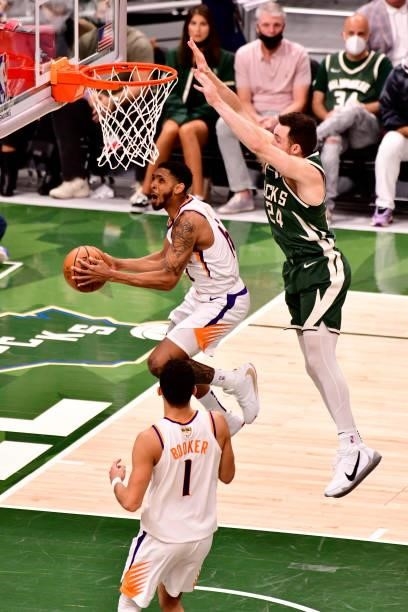 July 11: Cameron Payne of the Phoenix Suns drives to the basket against the Milwaukee Bucks during Game Three of the 2021 NBA Finals on July 11, 2021...