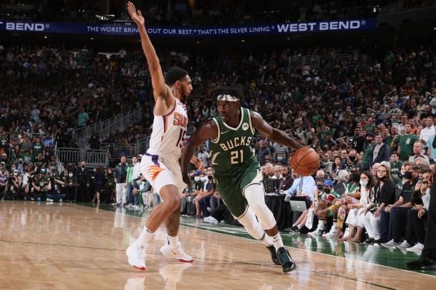 Cameron Payne of the Phoenix Suns plays defense on Jrue Holiday of the Milwaukee Bucks during Game Three of the 2021 NBA Finals on July 11, 2021 at...