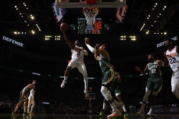 July 11: Chris Paul of the Phoenix Suns drives to the basket against the Milwaukee Bucks during Game Three of the 2021 NBA Finals on July 11, 2021 at...