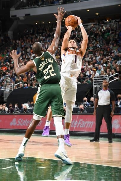 Devin Booker of the Phoenix Suns shoots the ball during the game against the Milwaukee Bucks during Game Three of the 2021 NBA Finals on July 11,...