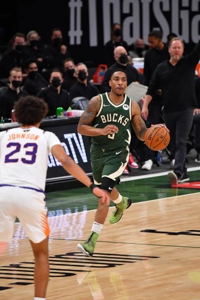 Jeff Teague of the Milwaukee Bucks handles the ball against the Phoenix Suns during Game Three of the 2021 NBA Finals on July 11, 2021 at Fiserv...