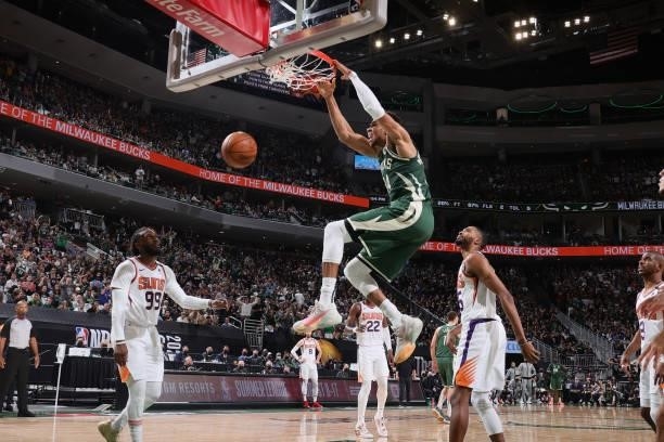 Giannis Antetokounmpo of the Milwaukee Bucks dunks the ball against the Phoenix Suns during Game Three of the 2021 NBA Finals on July 11, 2021 at the...