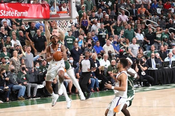 Cameron Payne of the Phoenix Suns drives to the basket against the Milwaukee Bucks during Game Three of the 2021 NBA Finals on July 11, 2021 at the...
