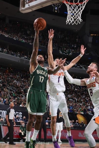 Tucker of the Milwaukee Bucks shoots the ball against the Phoenix Suns during Game Three of the 2021 NBA Finals on July 11, 2021 at the Fiserv Forum...