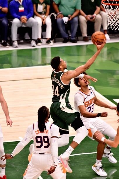July 11: Giannis Antetokounmpo of the Milwaukee Bucks drives to the basket against the Phoenix Suns during Game Three of the 2021 NBA Finals on July...
