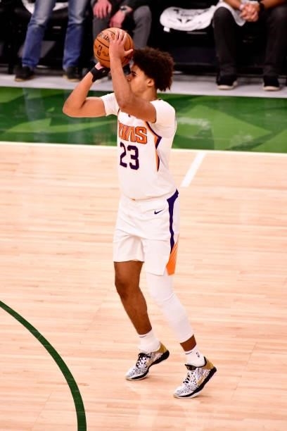 July 11: Cameron Johnson of the Phoenix Suns shoots a three point basket against the Milwaukee Bucks during Game Three of the 2021 NBA Finals on July...