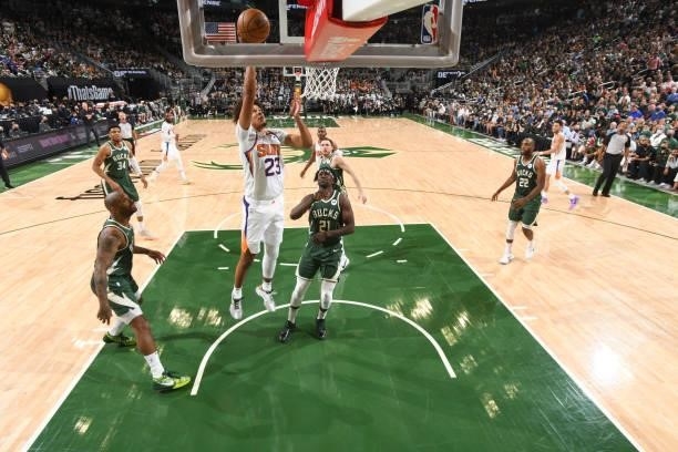 Cameron Johnson of the Phoenix Suns drives to the basket during the game against the Milwaukee Bucks during Game Three of the 2021 NBA Finals on July...
