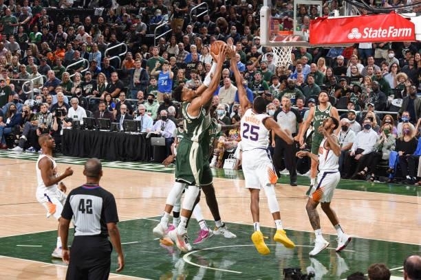 Giannis Antetokounmpo of the Milwaukee Bucks fights for the rebound during the game against the Phoenix Suns during Game Three of the 2021 NBA Finals...