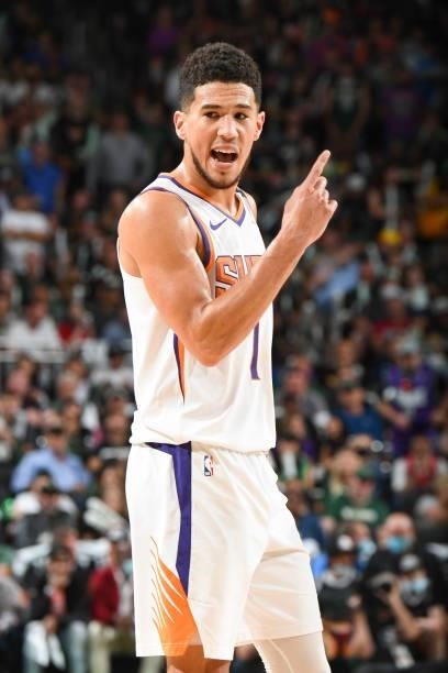 Devin Booker of the Phoenix Suns looks on during the game against the Milwaukee Bucks during Game Three of the 2021 NBA Finals on July 11, 2021 at...
