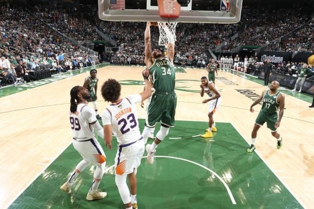 Giannis Antetokounmpo of the Milwaukee Bucks dunks the ball against the Phoenix Suns during Game Three of the 2021 NBA Finals on July 11, 2021 at the...