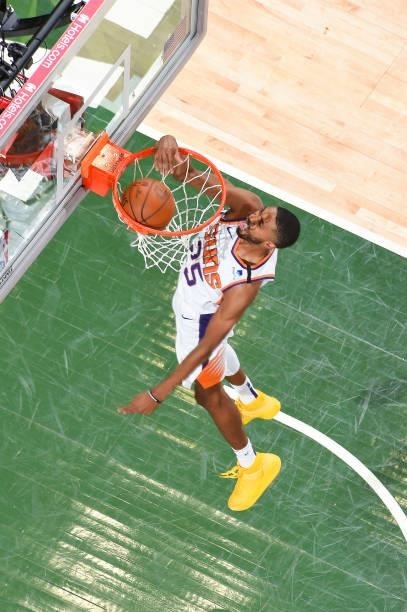 Mikal Bridges of the Phoenix Suns dunks the ball during the game against the Milwaukee Bucks during Game Three of the 2021 NBA Finals on July 11,...