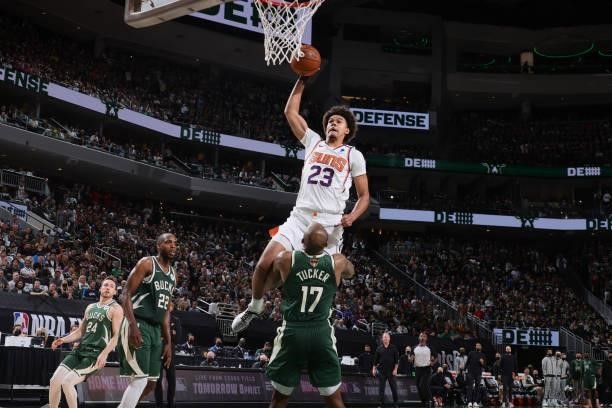 Cameron Johnson of the Phoenix Suns dunks the ball against the Milwaukee Bucks during Game Three of the 2021 NBA Finals on July 11, 2021 at the...
