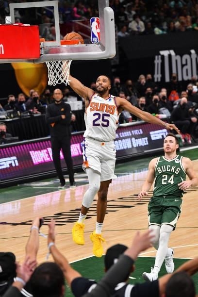 Mikal Bridges of the Phoenix Suns dunks the ball against the Milwaukee Bucks during Game Three of the 2021 NBA Finals on July 11, 2021 at Fiserv...