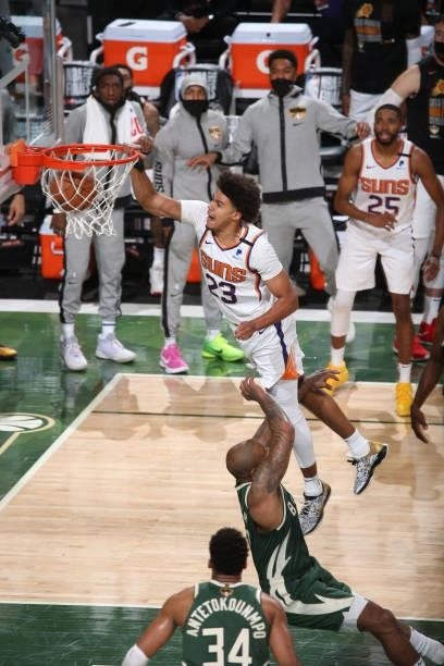 Cameron Johnson of the Phoenix Suns dunks the ball during the game against the Milwaukee Bucks during Game Three of the 2021 NBA Finals on July 11,...