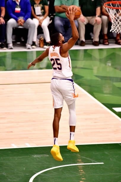 July 11: Mikal Bridges of the Phoenix Suns dunks the ball against the Milwaukee Bucks during Game Three of the 2021 NBA Finals on July 11, 2021 at...