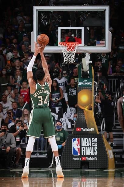 Giannis Antetokounmpo of the Milwaukee Bucks shoots a free throw against the Phoenix Suns during Game Three of the 2021 NBA Finals on July 11, 2021...