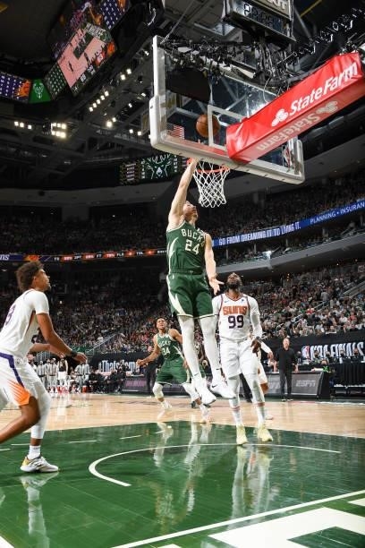 Pat Connaughton of the Milwaukee Bucks drives to the basket during the game against the Phoenix Suns during Game Three of the 2021 NBA Finals on July...