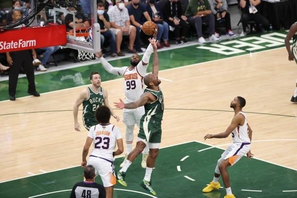 Jae Crowder of the Phoenix Suns grabs the rebound during the game against the Milwaukee Bucks during Game Three of the 2021 NBA Finals on July 11,...