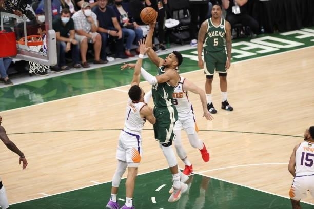 Giannis Antetokounmpo of the Milwaukee Bucks shoots the ball during the game against the Phoenix Suns during Game Three of the 2021 NBA Finals on...