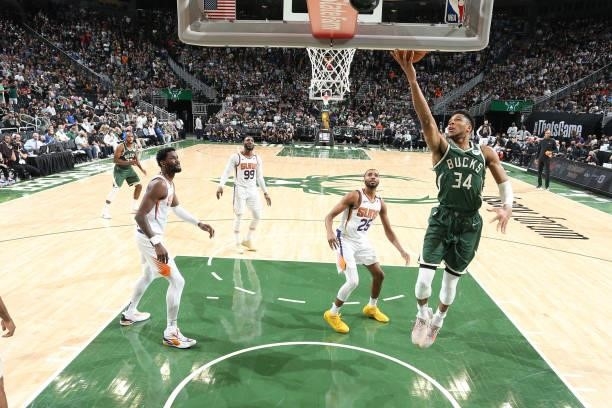 Giannis Antetokounmpo of the Milwaukee Bucks shoots the ball against the Phoenix Suns during Game Three of the 2021 NBA Finals on July 11, 2021 at...