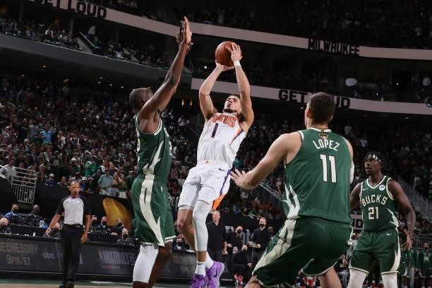 Devin Booker of the Phoenix Suns shoots the ball against the Milwaukee Bucks during Game Three of the 2021 NBA Finals on July 11, 2021 at the Fiserv...