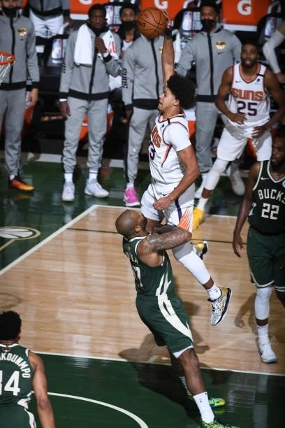July 11: Cameron Johnson of the Phoenix Suns dunks the ball against the Milwaukee Bucks during Game Three of the 2021 NBA Finals on July 11, 2021 at...