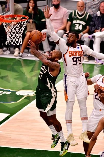 July 11: Jae Crowder of the Phoenix Suns blocks the shot of P.J. Tucker of the Milwaukee Bucks during Game Three of the 2021 NBA Finals on July 11,...