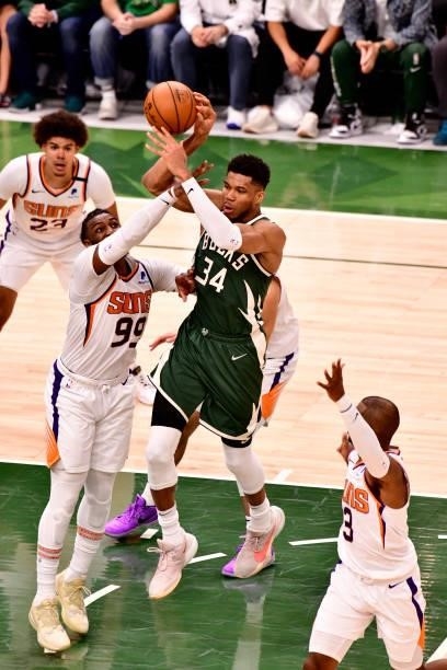 July 11: Giannis Antetokounmpo of the Milwaukee Bucks passes the ball against the Phoenix Suns during Game Three of the 2021 NBA Finals on July 11,...
