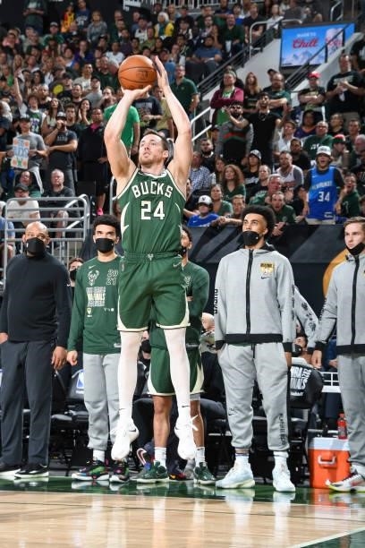 Pat Connaughton of the Milwaukee Bucks shoots a three point basket during the game against the Phoenix Suns during Game Three of the 2021 NBA Finals...
